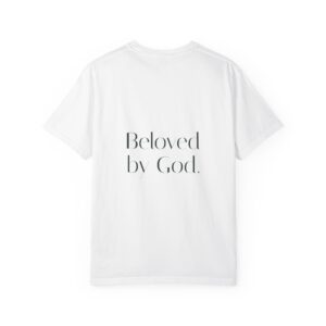 White T-shirt laid flat with the text 'Beloved by God' in a serif font visible on the front (partial view).