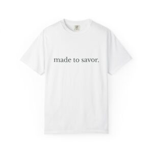 White T-shirt with the slogan 'made to savor' printed across the chest (black text on white fabric).