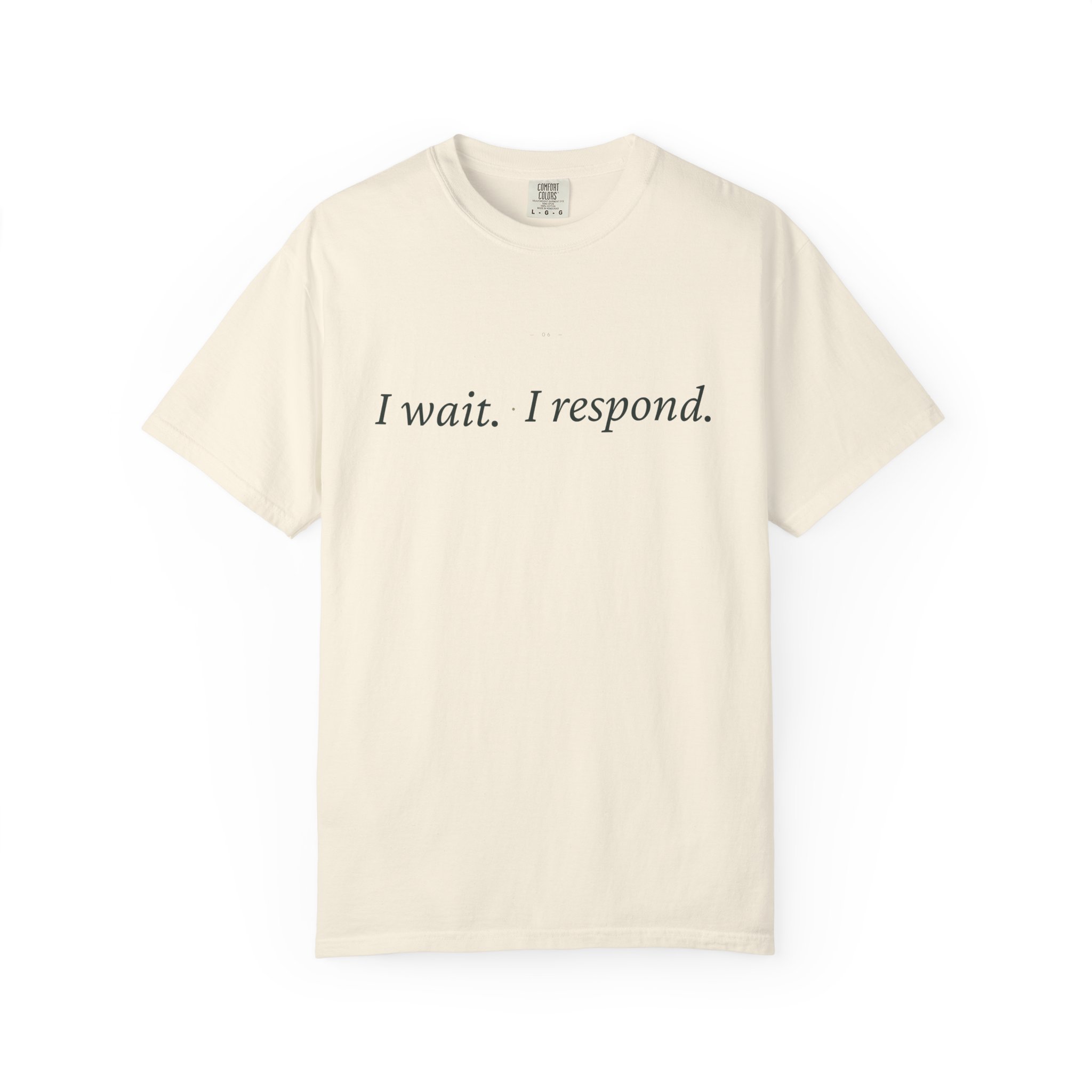 Beige crew-neck T-shirt with the words “I wait. I respond.” printed in black across the front, shown from chest up.