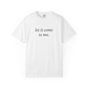 White T-shirt with black serif text reading "let it come to me" across the chest (neck tag visible).