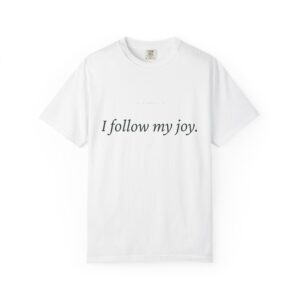 White T-shirt with black cursive slogan reading 'I follow my joy.'