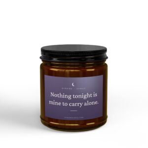 Close-up of a brown jar with a black lid; purple label reads 'Nothing tonight is mine to carry alone'.