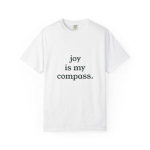White T-shirt with large black text reading 'joy is my compass' across the chest.