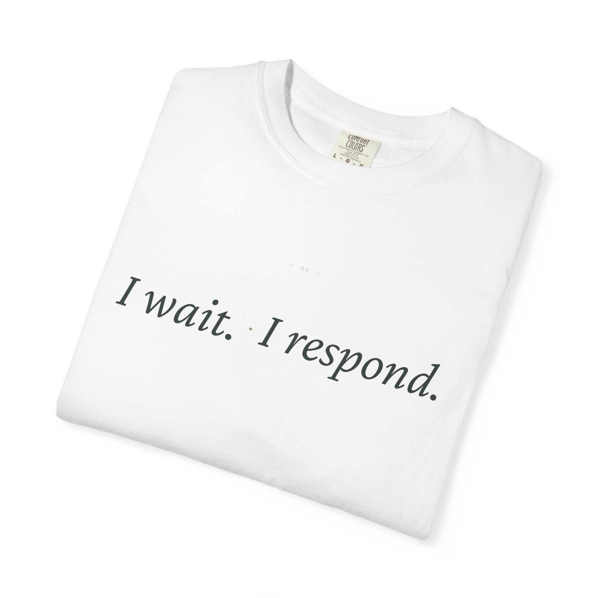 White folded crew-neck T-shirt with a size tag visible at the neck area